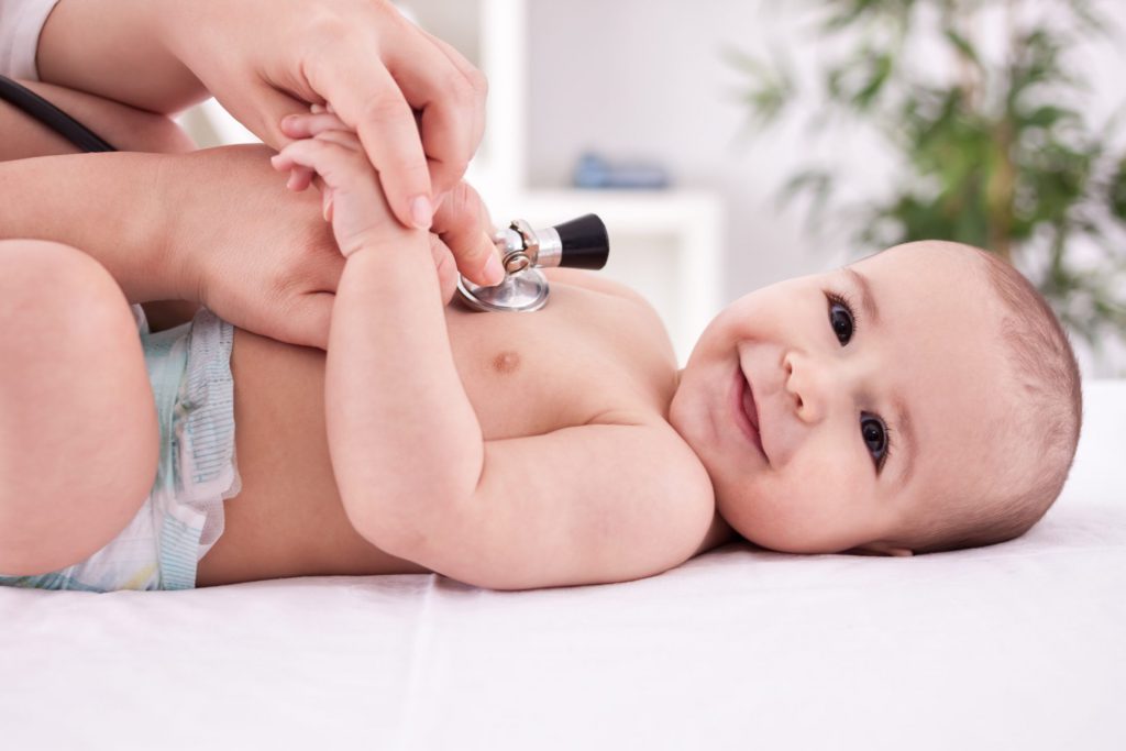 Smiling Baby Getting Heartbeat Checked